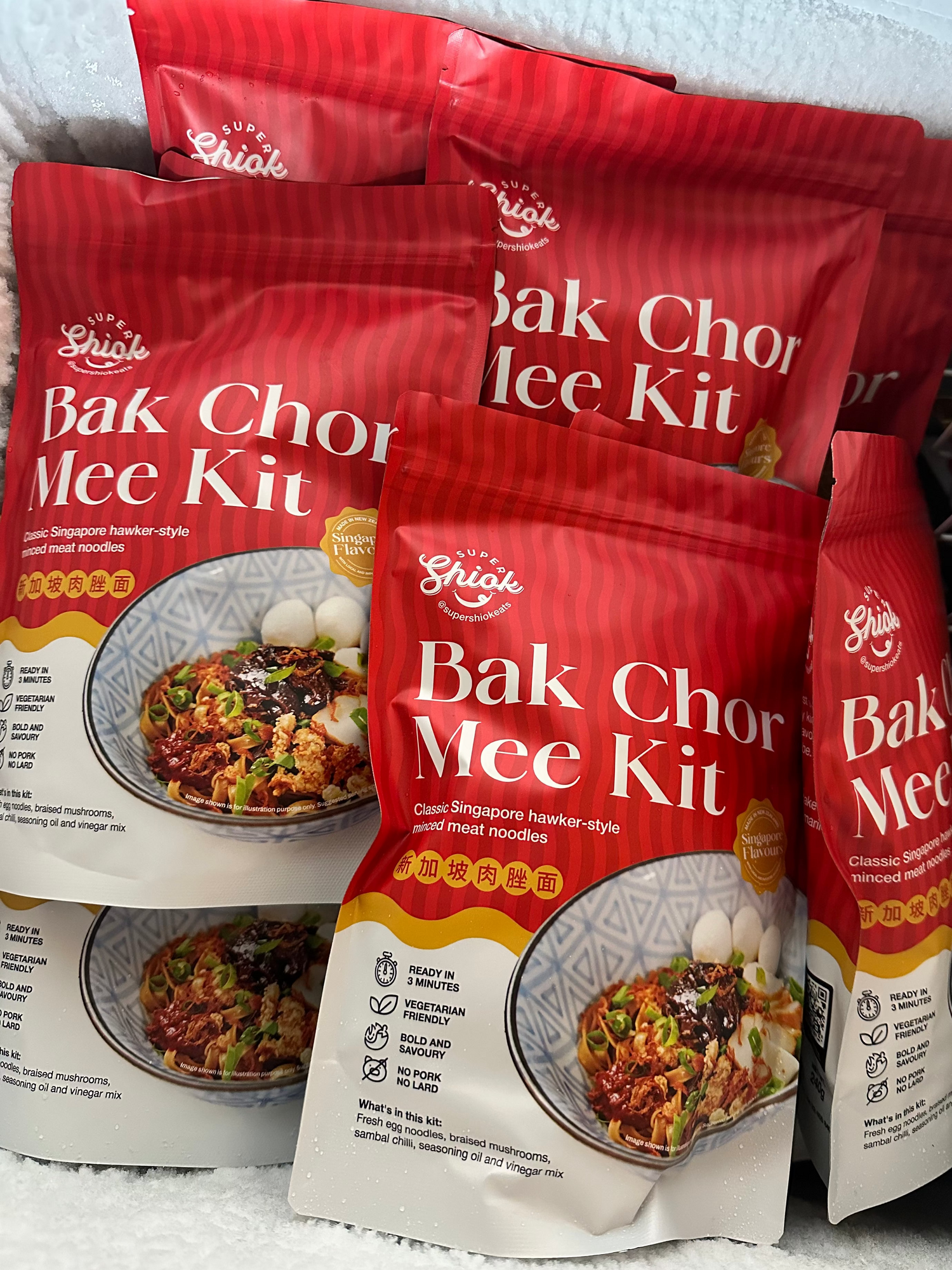 Packets of Bak Chor Mee Kit in a chest freezer